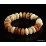 Unique buttons Baltic amber bracelet 7in