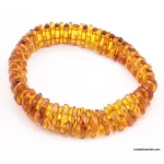 Facet cut pieces Baltic amber bracelet 7in