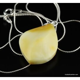 Genuine Baltic amber CARVED silver pendant
