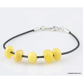 Charm beads Baltic amber leather bracelet