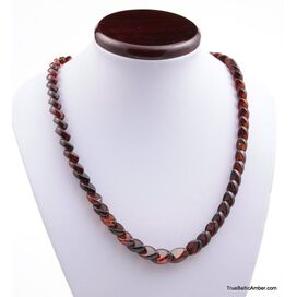 Overlapping ruby pieces Baltic amber necklace 21in