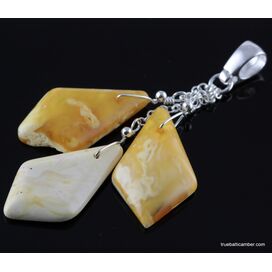 Carved Baltic amber pieces pendant