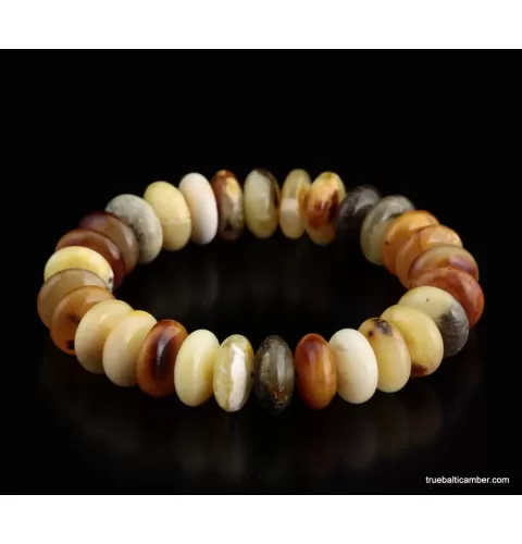 Unique buttons Baltic amber bracelet 7in