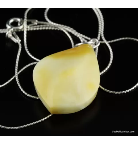 Genuine Baltic amber CARVED silver pendant