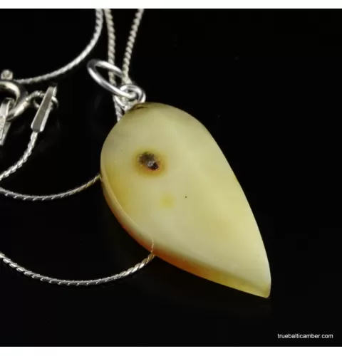 Genuine Baltic amber CARVED silver pendant