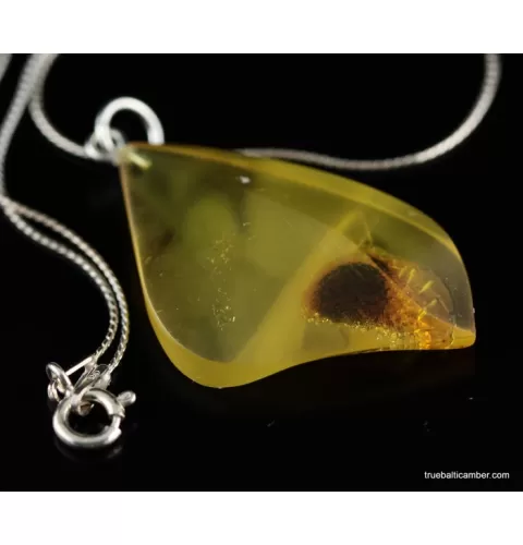 Genuine Baltic amber CARVED silver pendant