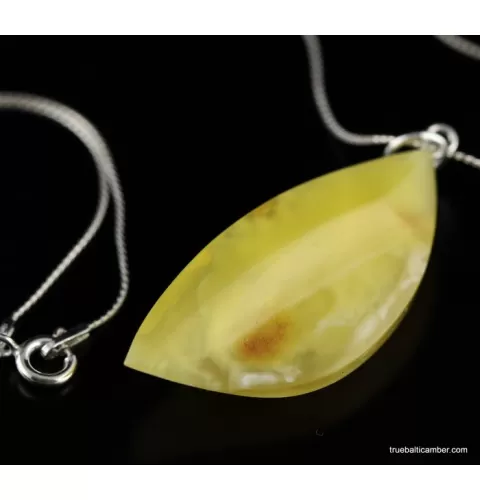 Genuine Baltic amber CARVED silver pendant
