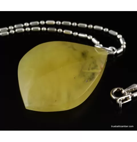 Genuine Baltic amber CARVED silver pendant