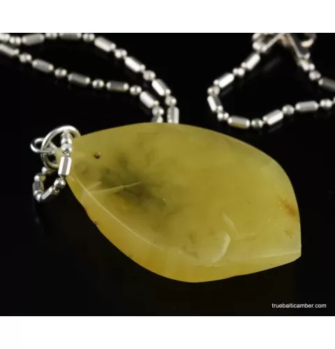 Genuine Baltic amber CARVED silver pendant