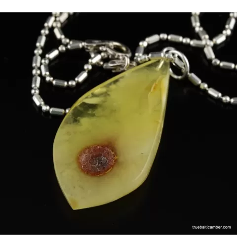 Genuine Baltic amber CARVED silver pendant