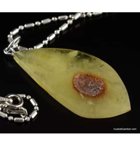 Genuine Baltic amber CARVED silver pendant