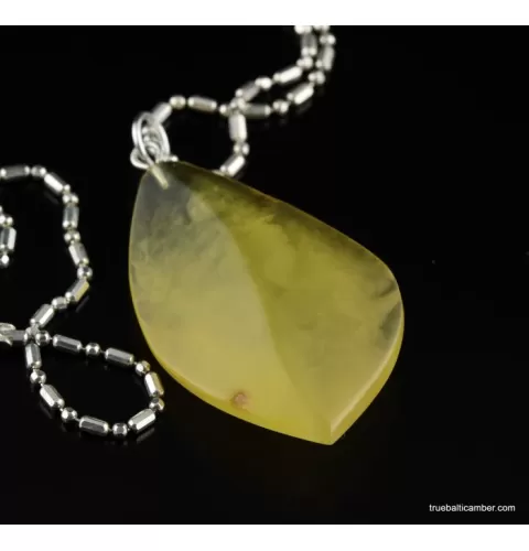 Genuine Baltic amber CARVED silver pendant