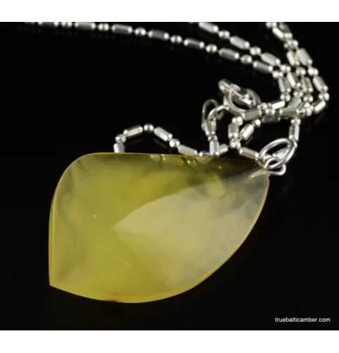 Genuine Baltic amber CARVED silver pendant