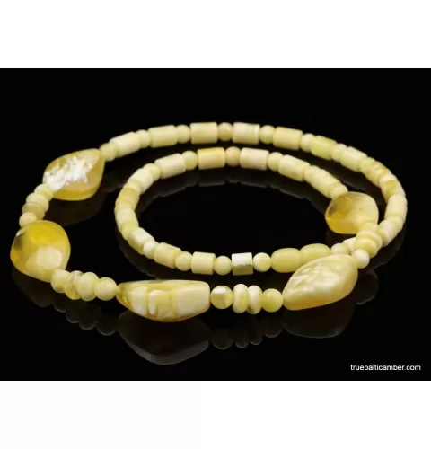 White composition Baltic amber necklace 21in