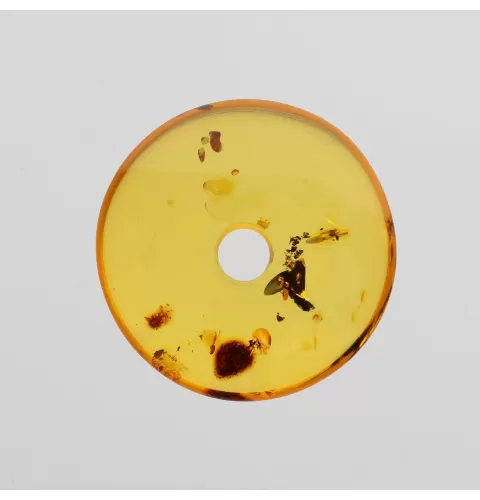 Donut shape Baltic amber pendant medallion