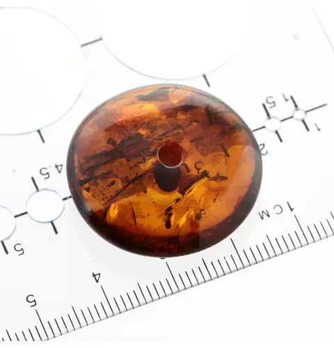Donut shape Baltic amber pendant medallion