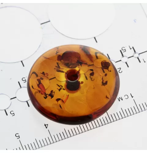 Donut shape Baltic amber pendant medallion