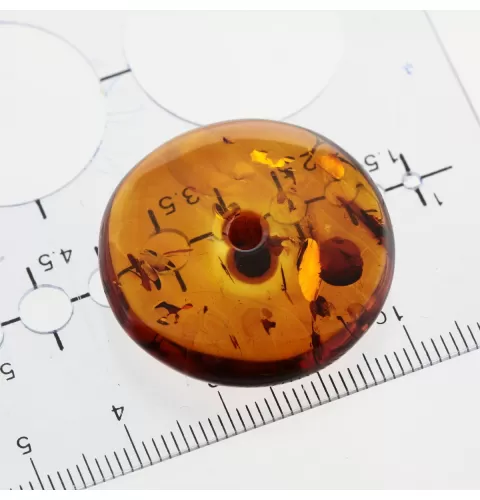 Donut shape Baltic amber pendant medallion
