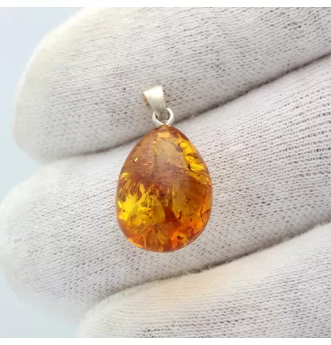 Glittering Carved Baltic Amber Pendant