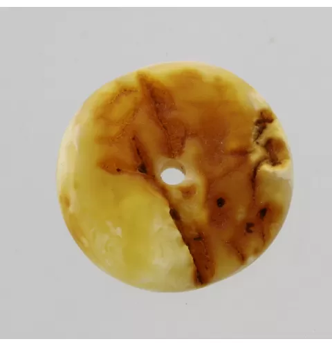 Donut shape Baltic amber pendant medallion