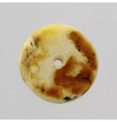 Donut shape Baltic amber pendant medallion