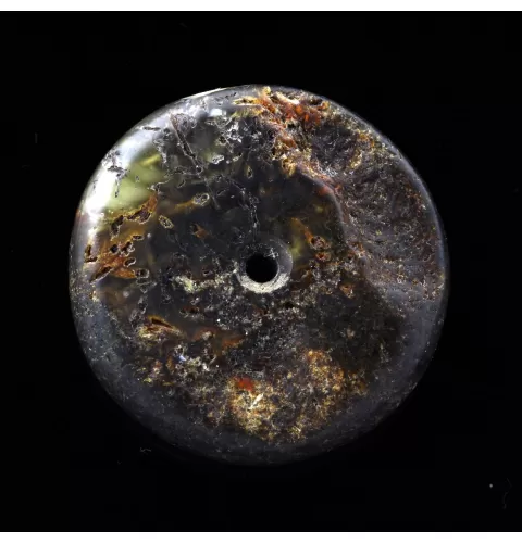 Donut shape Baltic amber pendant medallion