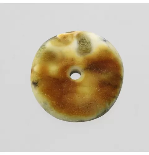 Donut shape Baltic amber pendant medallion