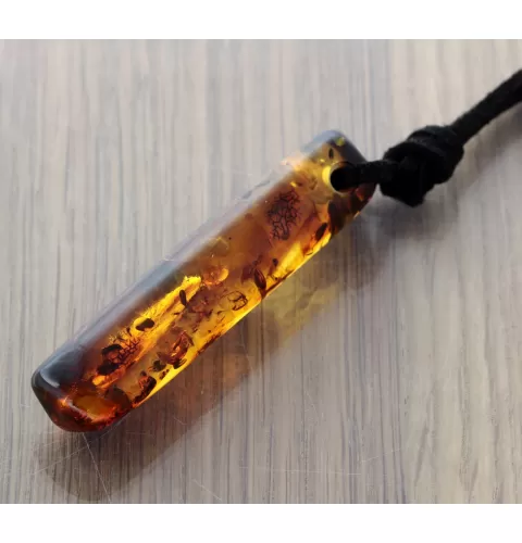 Natural Amber Hole Pendant w Leather Cord