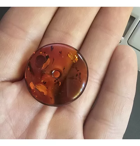 Donut shape Baltic amber pendant medallion