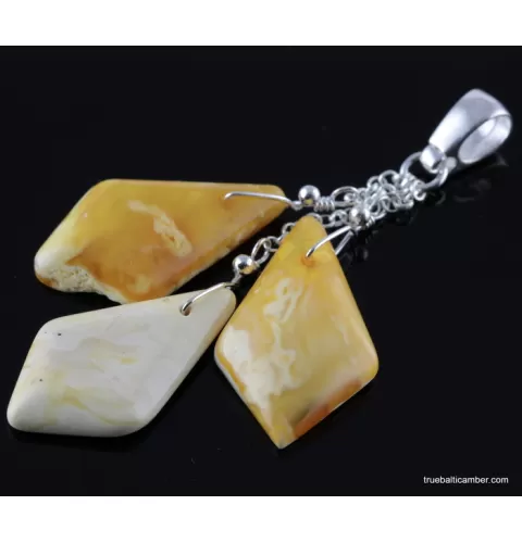 Carved Baltic amber pieces pendant
