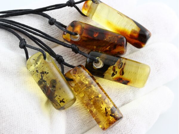 5 Natural Amber Pendants w Leather Cord