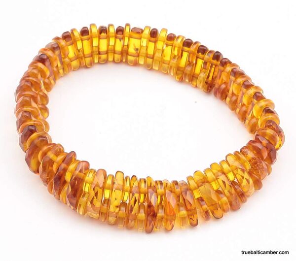 Facet cut pieces Baltic amber bracelet 7in