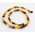Overlapping Rainbow pieces Baltic amber necklace