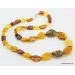 Cut stones Baltic amber knotted necklace 26in