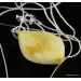 Genuine Baltic amber CARVED silver pendant