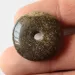 Donut shape Baltic amber pendant medallion