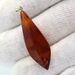 Glittering Carved Baltic Amber Pendant