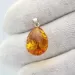 Glittering Carved Baltic Amber Pendant