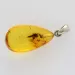Glittering Carved Baltic Amber Pendant