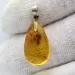 Glittering Carved Baltic Amber Pendant