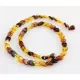 Overlapping Rainbow pieces Baltic amber necklace